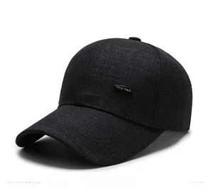 Detail of dark gray baseball cap featuring woven texture and HAO WeN metal logo side accent