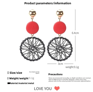 Detailed view of dreamcatcher earrings with size 6.4cm x 3cm and 9.1g weight specs