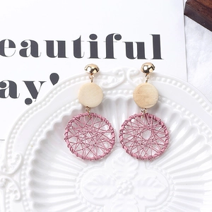 Handmade bohemian hollow pink woven hoop earrings with natural wooden disc and golden stud