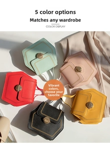 Top view of geometric hexagonal handbags in five vibrant colors with metal swivel locks