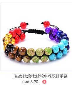 Detail of a handmade double-layer chakra bead bracelet with adjustable braided rope