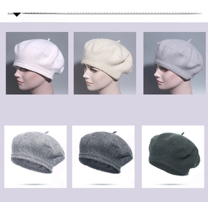 Classic wool beret available in multiple colors including white, beige, and grey shades