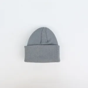 Close-up of the dark grey knitted texture and wide cuff design of the toddler beanie