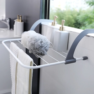Foldable white metal radiator drying rack with grey adjustable hooks for small spaces