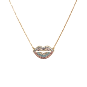 Golden lip pendant necklace with vibrant multi-color zircons on a white background