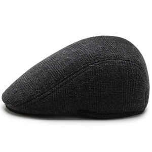 Men's dark gray winter flat cap with ear protection made of warm textured fabric