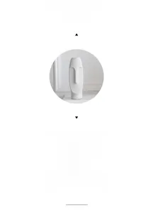 Close-up of minimalist white ceramic vase with an abstract human face contour design