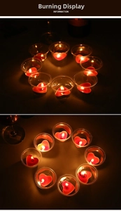 Detailed view of nine heart-shaped red tea light candles burning in a circular layout