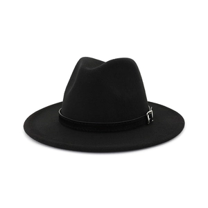 Detail of wool fedora hat featuring classic black felt texture and silver buckle strap