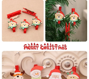 Dettagli di clip natalizie in legno assortite con figure di Babbo Natale e renne