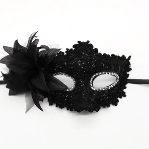 Elegant black lace masquerade mask with a large fabric rose and silver sequin accents