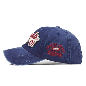 Navy blue washed cotton baseball cap with Orlando letter embroidery and distressed brim