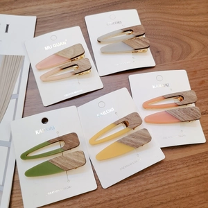 Triangle wooden patchwork hair clips in candy colors like pink, beige, and green