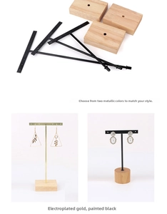 Detail of T-bar earring display set with wooden bases in gold and black finishes