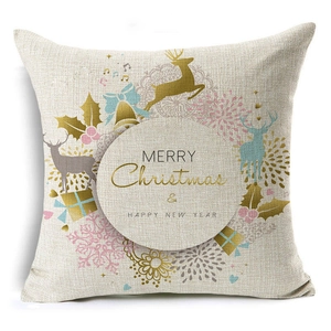 Detailed texture of linen pillowcase with golden reindeer and Christmas holiday patterns