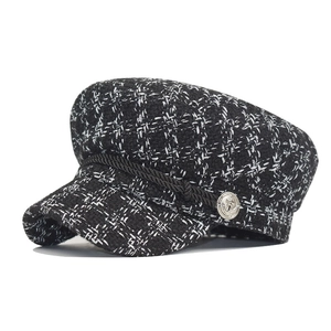 Classic black and white tweed octagonal baker boy hat with silver anchor button detail