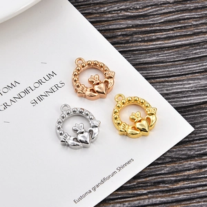 Classic Claddagh heart pendants in gold, silver, and rose gold for DIY jewelry making