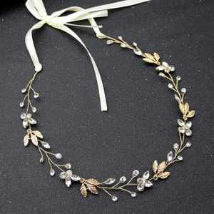Exquisite bridal leaf hair band with sparkling rhinestones and elegant white ribbon tie