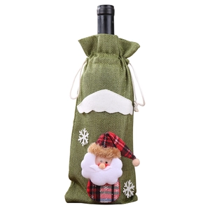 Green burlap Christmas wine bottle bag with Santa Claus doll and snowflake patterns