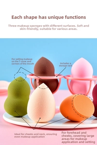 Detail of multi-colored makeup sponge set with slanted and teardrop shapes on a rack