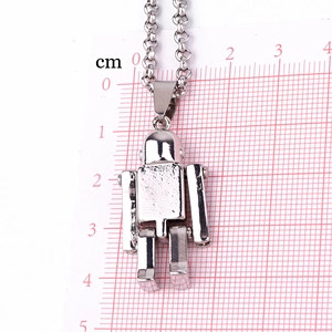 Silver robot pendant necklace for men and women, measuring 4cm on a scale ruler