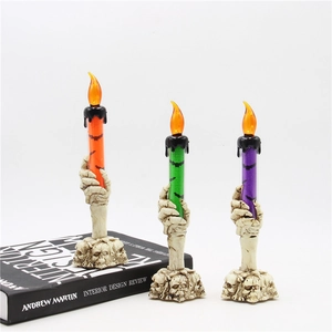 Three-piece Halloween LED skull candle holders with fake flame in orange green and purple