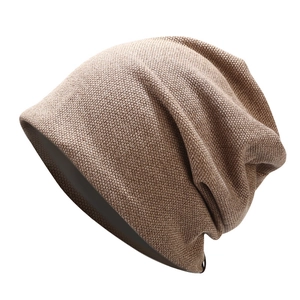 Unisex slouchy knit beanie in dark khaki, versatile winter skull cap for men and women