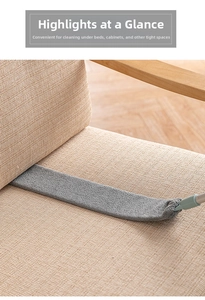 Detail view of microfiber gap duster cleaning narrow spaces between sofa cushions