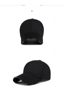 Detail of black cotton baseball cap featuring white VESPORTS letter print on the brim