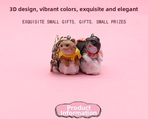 Macro detail of 3D sushi cat keychains featuring orange and black-and-white kittens