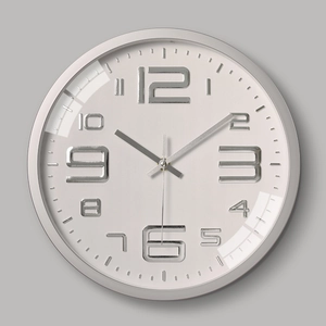 Modern 12-inch minimalist round wall clock with silver frame and 3D numerals