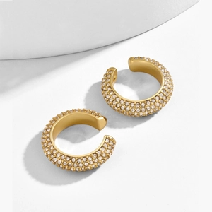 Golden C-shaped ear cuffs with multi-row pavé-set crystals in a vintage minimalist style