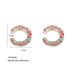 Detail view of C-shaped rhinestone ear cuffs showing 1.8cm diameter and 6g weight