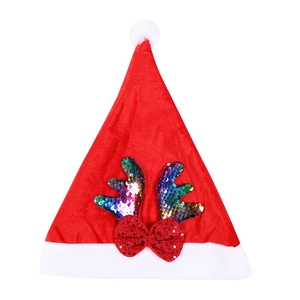 Red Christmas hat with reversible sequins and colorful reindeer antlers on white background