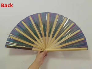 Macro detail of iridescent laser kung fu fan with natural bamboo ribs and purple gradient