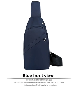 Front view of blue sling bag featuring built-in headphone port and metal U-hook detail