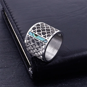 Wide hollow stainless steel ring featuring iridescent abalone shell inlay on dark leather