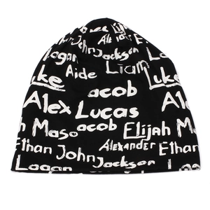 Black knit beanie with all-over white graffiti style names for men and women