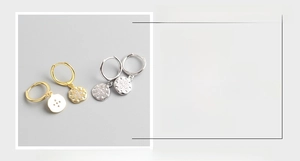 Detailed view of S925 sterling silver hammered star hoop earrings with size specifications