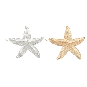 Pair of vintage starfish hair clips in gold and silver finish with textured surface