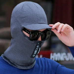Close-up of gray knit balaclava with zipper face guard and fleece lining detail