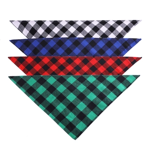 Close-up of four plaid cotton dog bandanas in buffalo check patterns of various colors
