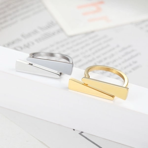 Minimalist triangle geometric stainless steel rings in gold and silver finishes