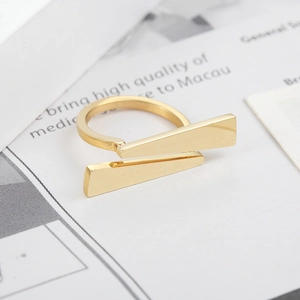 Minimalist gold triangle titanium steel ring featuring a modern geometric stacked design