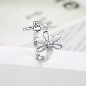 Minimalist silver sunflower ring with dual hollow floral design on a sleek pedestal