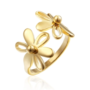 Detailed view of dual sun flower gold plated titanium steel ring with adjustable band