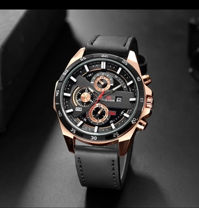 Macro side view of rose gold quartz watch with three sub-dials and black leather strap