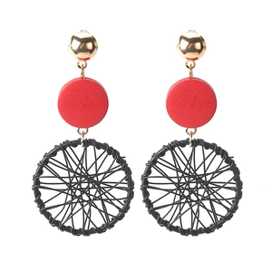 Long vintage geometric earrings with red circles and black woven tassels in gold finish