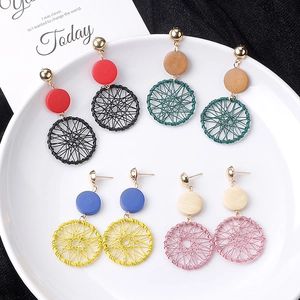 Bohemian dreamcatcher drop earrings with woven tassel details in multiple vibrant colors
