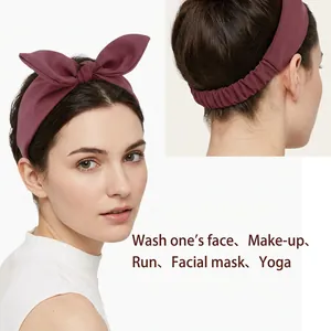 Burgundy knot bunny ear headband for women with soft knit texture and elastic band